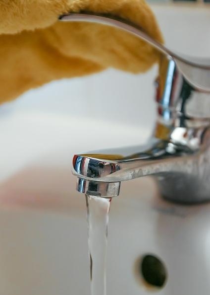 Bathroom sink faucet repair by Milwaukee area plumbers from Andersen Plumbing.