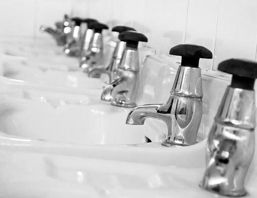 Commercial bathroom faucets installed and repaired by professional Wisconsin plumbers.